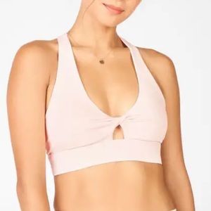 Fabletics Oasis Twist Sports Bra in Icy Pink